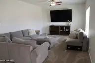 2016 Eleuthera Way, Elizabeth City, NC 27909 — 4-bedroom home in Herons Ridge, Elizabeth City, NC, photo 3 of 16: Living Room