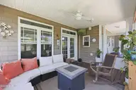 303 Duck Haven, Swansboro, NC 28584 — 3-bedroom waterfront home in Bluewater Cove, Swansboro, NC, photo 16 of 49: Covered back porch