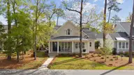 3606 Barnesmore Drive, Castle Hayne, NC 28429 — 4-bedroom home in River Bluffs, Castle Hayne, NC, photo 1 of 77: 70_dji_20260331104847_0069_d