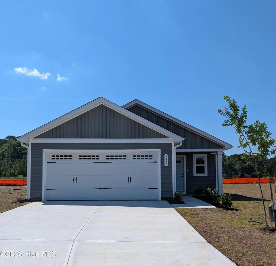 6007 Roundwood Drive NW, Ash, NC 28420 — 3-bedroom home in Sterling Oaks, Ash, NC, photo 1 of 15