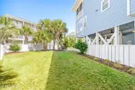 14 Private Drive, Ocean Isle Beach, NC 28469 — 5-bedroom home in Summer Place, Ocean Isle Beach, NC, photo 13 of 64: Big Yard