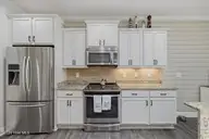8270 Stenton Drive NE, Leland, NC 28451 — 4-bedroom townhome in Compass Pointe, Leland, NC, photo 14 of 55