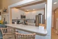 23 Ibis Roost, Bald Head Island, NC 28461 — 3-bedroom home in Ibis Roost, Bald Head Island, NC, photo 15 of 40: Breakfest Bar