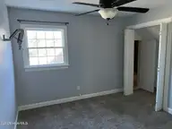214 E Raintree Lane, Goldsboro, NC 27534 — 4-bedroom home in Raintree, Goldsboro, NC, photo 13 of 19: Bedroom 2