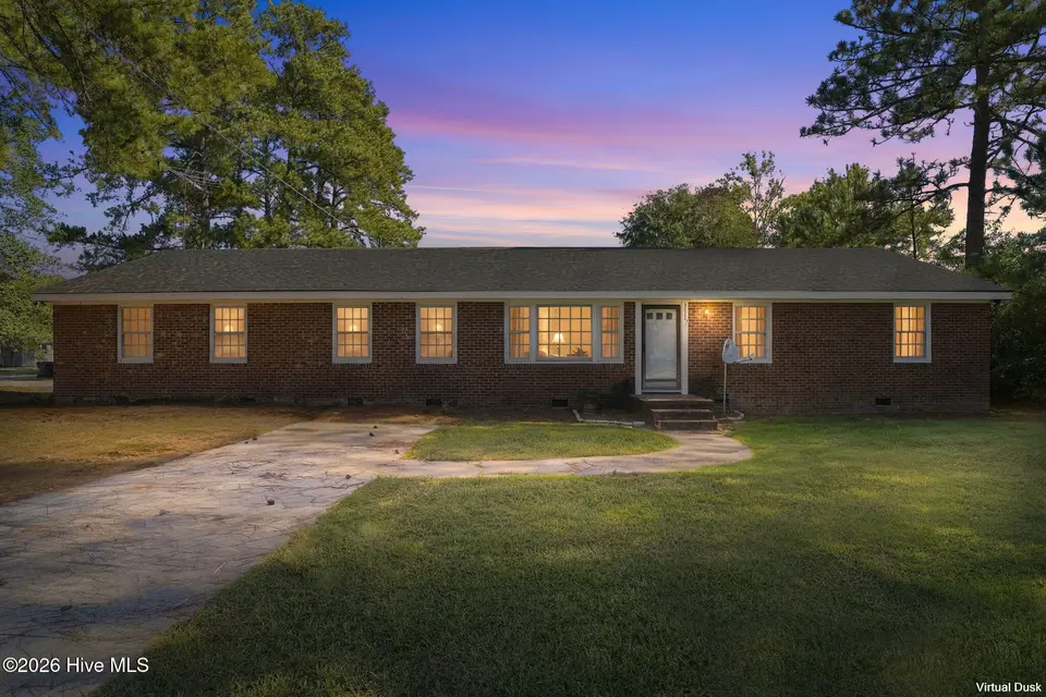 3822 Bridgers Street NW, Wilson, NC 27896 — 4-bedroom home in Newton Park, Wilson, NC, photo 1 of 48: Front Dusk