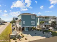 4929 E Pelican Drive, Oak Island, NC 28465 — 4-bedroom waterfront home in Tranquil Harbor, Oak Island, NC, photo 2 of 41