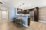 117 NE 19th Street, Oak Island, NC 28465 — 3-bedroom home in Tranquil Harbor, Oak Island, NC, photo 12 of 77: Kitchen Bar