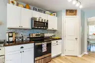 3008 Arundel Hill SW, Shallotte, NC 28470 — 4-bedroom home in Rutledge, Shallotte, NC, photo 15 of 45: Butcher block counter tops