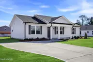 236 Rae Street, Warsaw, NC 28398 — 3-bedroom home in Wade Street Subdivision, Warsaw, NC, photo 3 of 29: 236 Rea St-4 grass