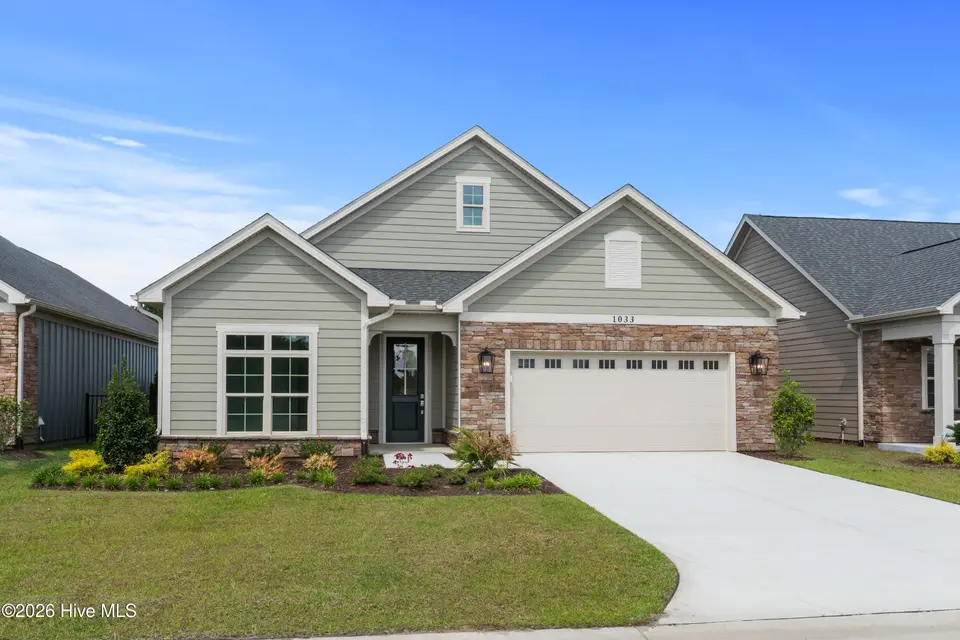 1033 Northbridge Court NW, Ocean Isle Beach, NC 28469 — 2-bedroom home in Courtyards by Carrell, Ocean Isle Beach, NC, photo 1 of 66: Front Elevation