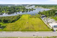 000 undefined Old Bridge Street, Jacksonville, NC 28540 — waterfront lot, Jacksonville, NC, photo 1 of 29: 1-web-or-mls-DJI_0195 (1) copy