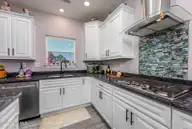 456 Pointe Vista Drive, Elizabeth City, NC 27909 — 4-bedroom waterfront home in The Waters At Sunset Pointe, Elizabeth City, NC, photo 22 of 49: 16-456 Pointe Vista - Kitchen-4