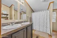 1221 Arvida Spur Road, Rocky Point, NC 28457 — 4-bedroom manufactured home in Arvida Lands, Rocky Point, NC, photo 15 of 44: 18_bathroom