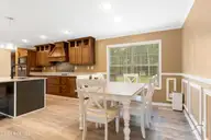 165 Godfrey Boulevard, Havelock, NC 28532 — 3-bedroom waterfront home in Godfreys Creek Estates, Havelock, NC, photo 13 of 52: Dining area