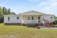 195 Calabash Road NW, Calabash, NC 28467 — 3-bedroom manufactured home in Carolina Shores, Calabash, NC, photo 1 of 37: 195 Calabsh Road