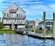 517 Canal Drive, Carolina Beach, NC 28428 — 4-bedroom waterfront home, Carolina Beach, NC, photo 1 of 76