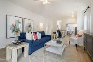 462 Galloping Foal Way SE, Bolivia, NC 28422 — 3-bedroom home in River Tide Farms, Bolivia, NC, photo 12 of 24: Great Room to Kitchen 2 - Brunswick