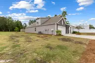 2260 Grande Palms Trail SE, Bolivia, NC 28422 — 4-bedroom home in Grande Palms, Bolivia, NC, photo 2 of 48: Left Side Yard