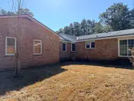 19 Wilkins Road, Belhaven, NC 27810 — 4-bedroom home, Belhaven, NC, photo 11 of 61: 10 Back of Garage and house