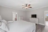 5732 Brown Pelican Lane, Wilmington, NC 28409 — 4-bedroom home in Kaylies Cove, Wilmington, NC, photo 20 of 38: 20_primary bedroom