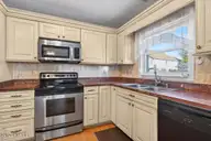 104 NE 34th Street, Oak Island, NC 28465 — 3-bedroom home, Oak Island, NC, photo 21 of 56: 22-kahunaphoto