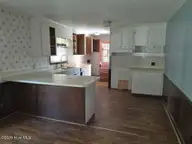 229 Martin Sasser Drive, Rocky Mount, NC 27801 — 3-bedroom home in Hazelwood, Rocky Mount, NC, photo 3 of 8: 56 KITCHEN