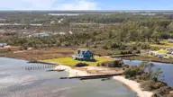 216 Styron Creek Road, Sea Level, NC 28577 — 3-bedroom waterfront home, Sea Level, NC, photo 4 of 63: 67-web-or-mls-DJI_20250321161608_0225_D