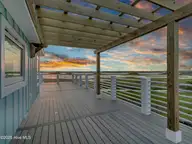 825 S Topsail Drive, Surf City, NC 28445 — 6-bedroom waterfront home in Yow Poisson, Surf City, NC, photo 3 of 74