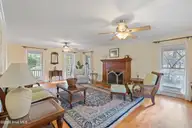 1321 Marsh Line Court SW, Shallotte, NC 28470 — 3-bedroom waterfront home in Marsh Cove, Shallotte, NC, photo 10 of 75: Wood Burning Fireplace