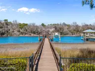 2502 W Yacht Drive, Oak Island, NC 28465 — 4-bedroom waterfront home, Oak Island, NC, photo 8 of 50: 22-web-or-mls-DJI_20260224131539_0622_D