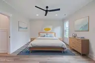 125 Cove Side Lane, Hampstead, NC 28443 — 4-bedroom waterfront home in Pelican Sound, Hampstead, NC, photo 16 of 29: stagedbedroomprimary