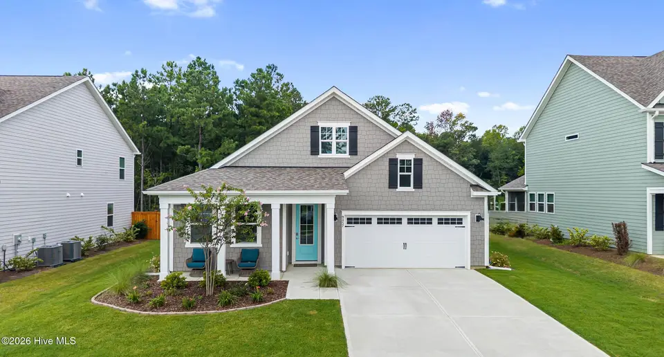 9457 Crowded Gules Drive, Leland, NC 28451 — 3-bedroom home in Indigo Preserve, Leland, NC, photo 1 of 67: 42_dji_20260824113427_0001_d