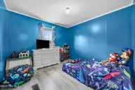 705 Maynard Boulevard, Jacksonville, NC 28546 — 3-bedroom manufactured home in Maynard Manor, Jacksonville, NC, photo 24 of 36: Bedroom 1