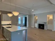 9418 Fallen Pear Lane NE, Leland, NC 28451 — 4-bedroom home in The Bluffs on the Cape Fear, Leland, NC, photo 11 of 16: Photo Jan 22 2026, 11 15 44 AM