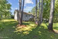 102 Lunington Mill Circle, Burgaw, NC 28425 — 3-bedroom home in Morgan Cove Plantation, Burgaw, NC, photo 24 of 30: Back Yard