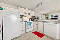 1530 Salter Path Road 15, Indian Beach, NC 28512 — 2-bedroom waterfront manufactured home in Tradewinds, Indian Beach, NC, photo 10 of 32: Kitchen