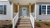 219 Willowbrook Drive, Pikeville, NC 27863 — 3-bedroom home in Willowbrook, Pikeville, NC, photo 2 of 27: Front Porch