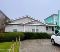 832 Fort Fisher Boulevard N, Kure Beach, NC 28449 — 4-bedroom waterfront home in Hanby Beach, Kure Beach, NC, photo 1 of 5: Front of House