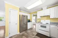 141 Crystal Road, Southport, NC 28461 — 3-bedroom home, Southport, NC, photo 13 of 40: 141 Crystal Rd Kitchen 2