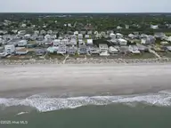 3518 E Beach Drive, Oak Island, NC 28465 — 3-bedroom waterfront home in E. Long Beach, Oak Island, NC, photo 5 of 39: DJI_0300