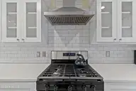 1321 Marsh Line Court SW, Shallotte, NC 28470 — 3-bedroom waterfront home in Marsh Cove, Shallotte, NC, photo 19 of 75: Gas Range