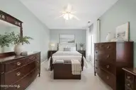 1601 River Bluff Road, Morehead City, NC 28557 — 3-bedroom waterfront home in South Shores, Morehead City, NC, photo 19 of 32: 2nd BR redecorated by AI