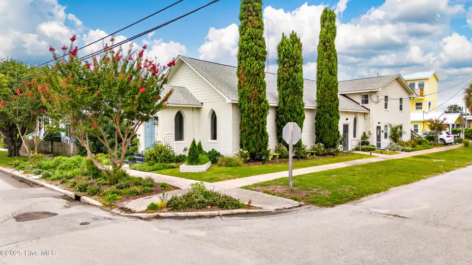 1300 Evans Street, Morehead City, NC 28557 — 4-bedroom waterfront home in The Promise Land, Morehead City, NC, photo 1 of 53: Side View