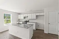 931 Plymouth Road, Boiling Spring Lakes, NC 28461 — 3-bedroom home in The Highlands at Boiling Spring Lakes, Boiling Spring Lakes, NC, photo 5 of 31: Sage Kitchen