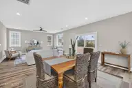 9575 Lily Pond Court NE, Leland, NC 28451 — 4-bedroom home in Lily Pond, Leland, NC, photo 10 of 37: Dining and living room