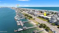 624 Waynick Boulevard Unit 101, Wrightsville Beach, NC 28480 — 1-bedroom waterfront condo in Banks Channel Condominiums, Wrightsville Beach, NC, photo 1 of 50