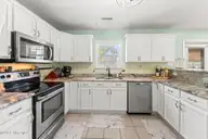 5801 E Yacht Drive, Oak Island, NC 28465 — 4-bedroom home in Tranquil Harbour Island, Oak Island, NC, photo 9 of 50