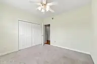 112 White Heron Lane, Swansboro, NC 28584 — 3-bedroom waterfront home in Bluewater Cove, Swansboro, NC, photo 23 of 60: Another view of bedroom 1