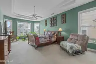 1013 Meadowlands Trail NW, Calabash, NC 28467 — 4-bedroom home in Meadowlands, Calabash, NC, photo 17 of 41: Owner's Suite