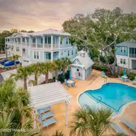 309 Red Lewis Drive 12, Kure Beach, NC 28449 — 4-bedroom townhome in The Cove at Kure Beach, Kure Beach, NC, photo 5 of 44: cove-pool2-1-1